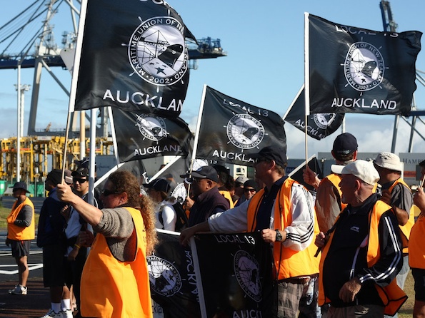 Members of the Maritime Union of New Zealand Local 13 march against outsourcing of waterfont jobs earlier this year.